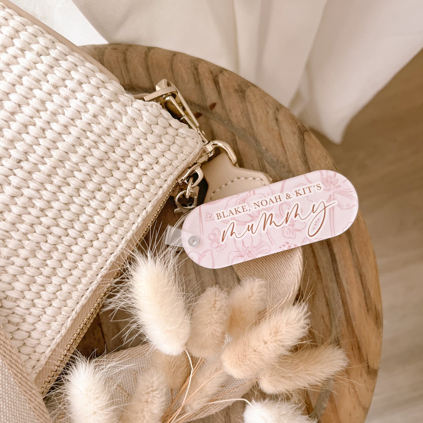 Personalised acrylic keychain by Salt And Pine Store attached to handbag