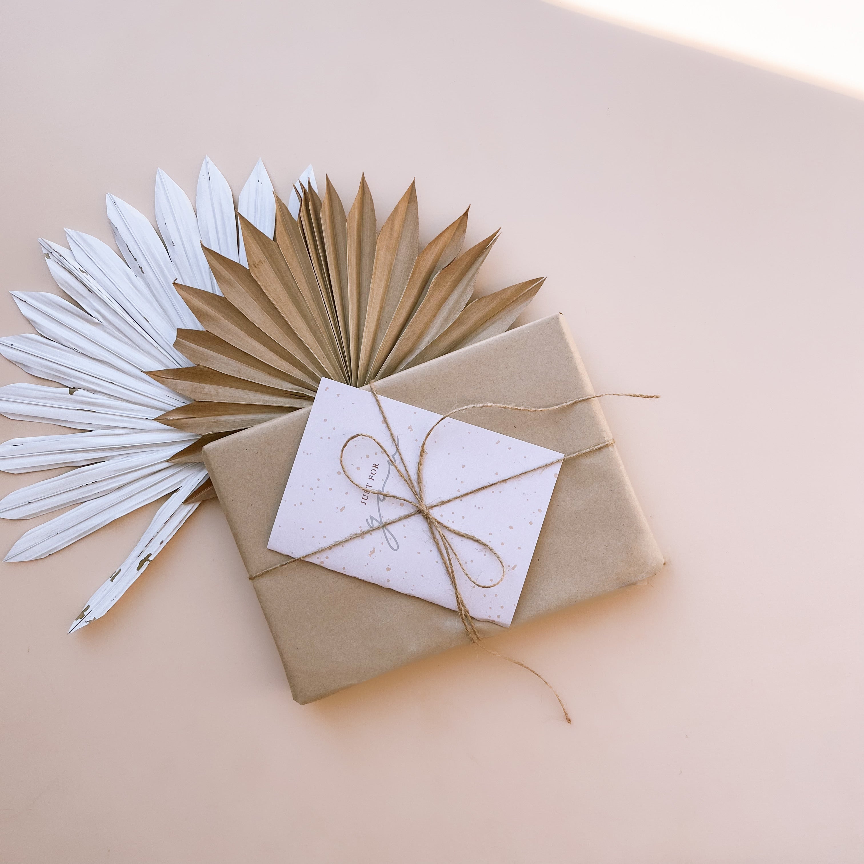 Beautifully wrapped gift with personalised card and neutral styling for handmade keepsake gifting.