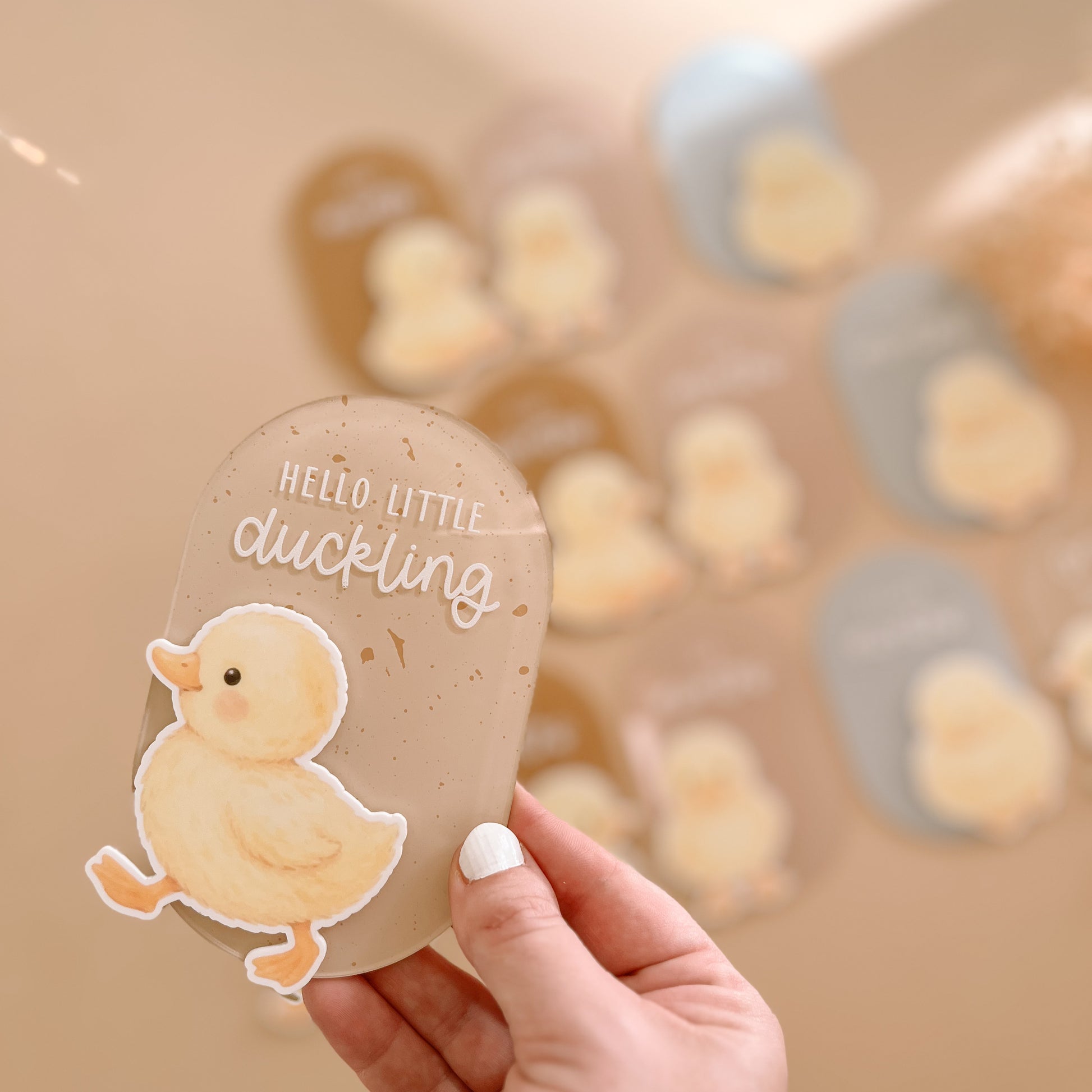 Duck themed baby milestone card with watercolour duckling design in neutral nursery tones
