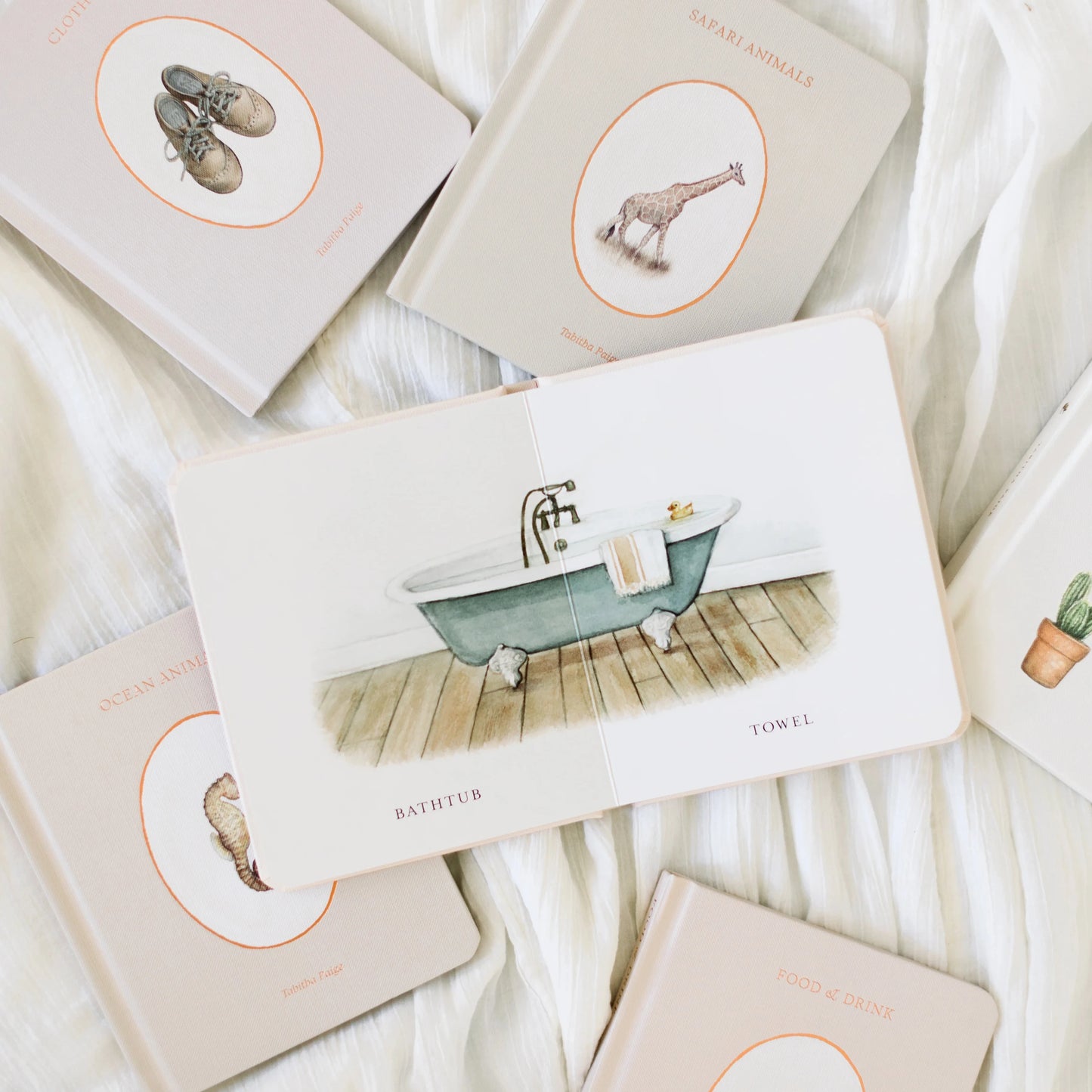 Set of greeting cards with illustrations on a soft white fabric background
